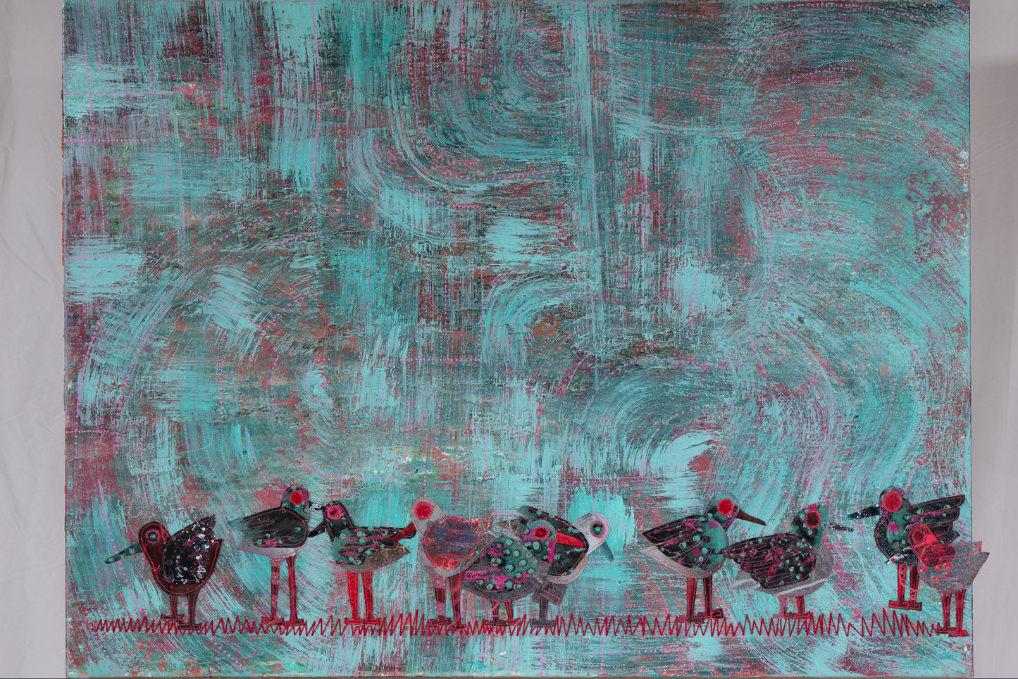 Abstract painting with wavy teal and red patterns and small hand sewn birds standing in a row at the bottom 